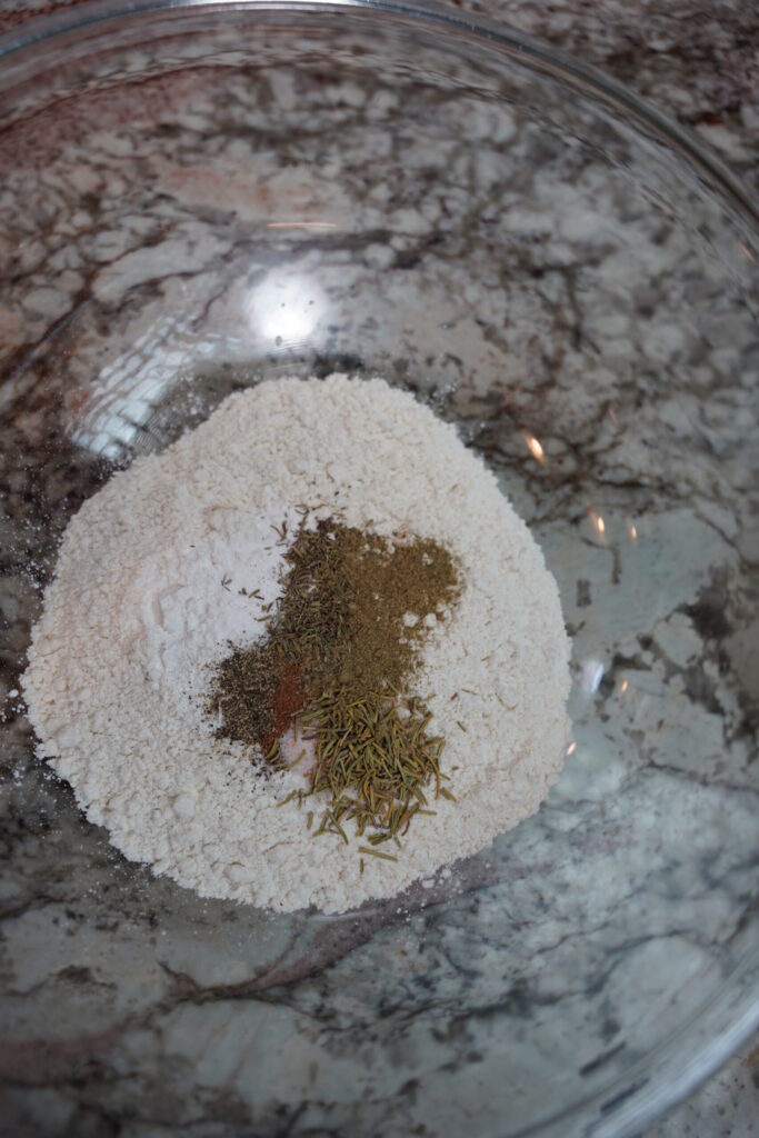 Dry ingredients for autumn seasoned biscuits, ready to be whisked.