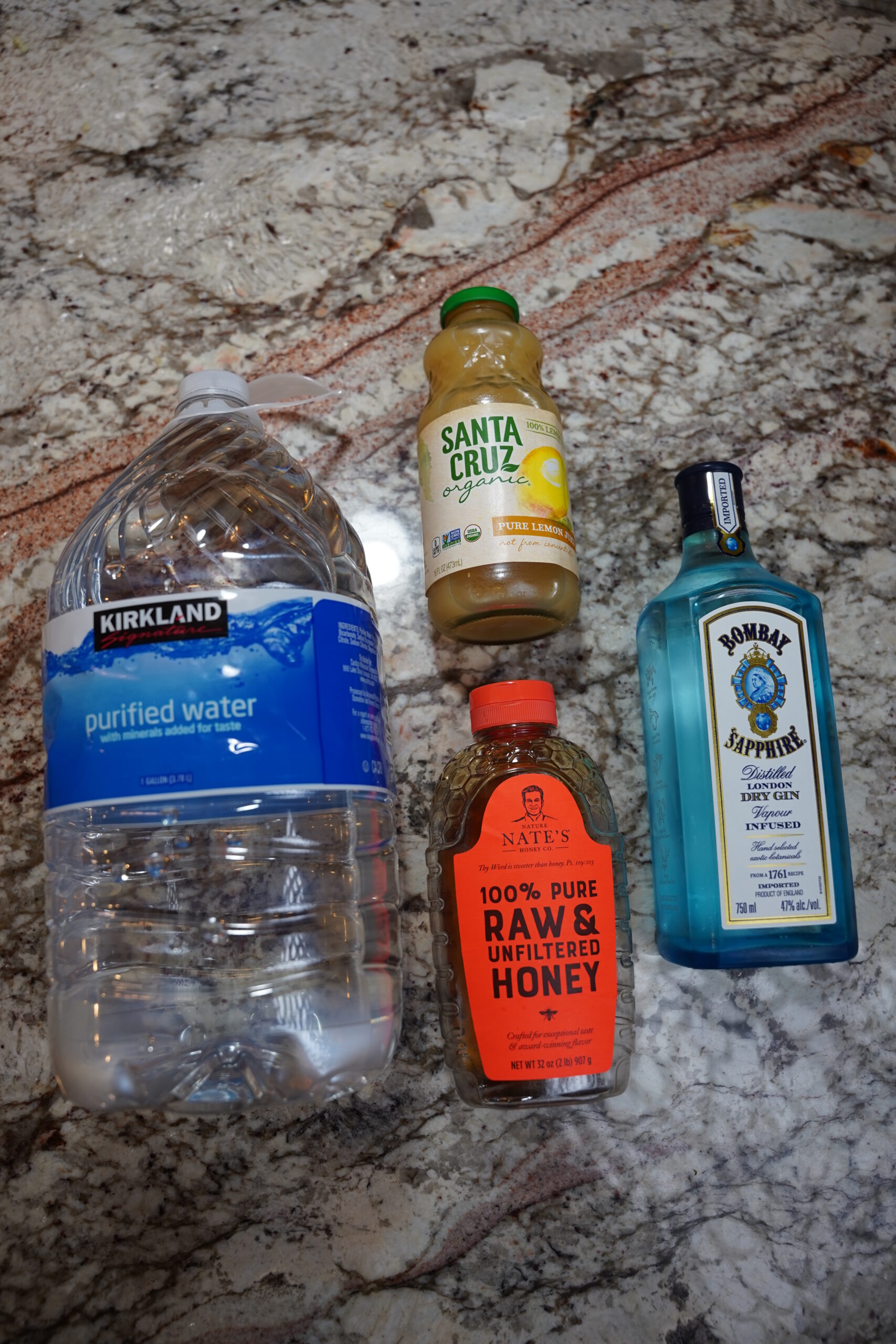 Water, honey, lemon juice, and gin.