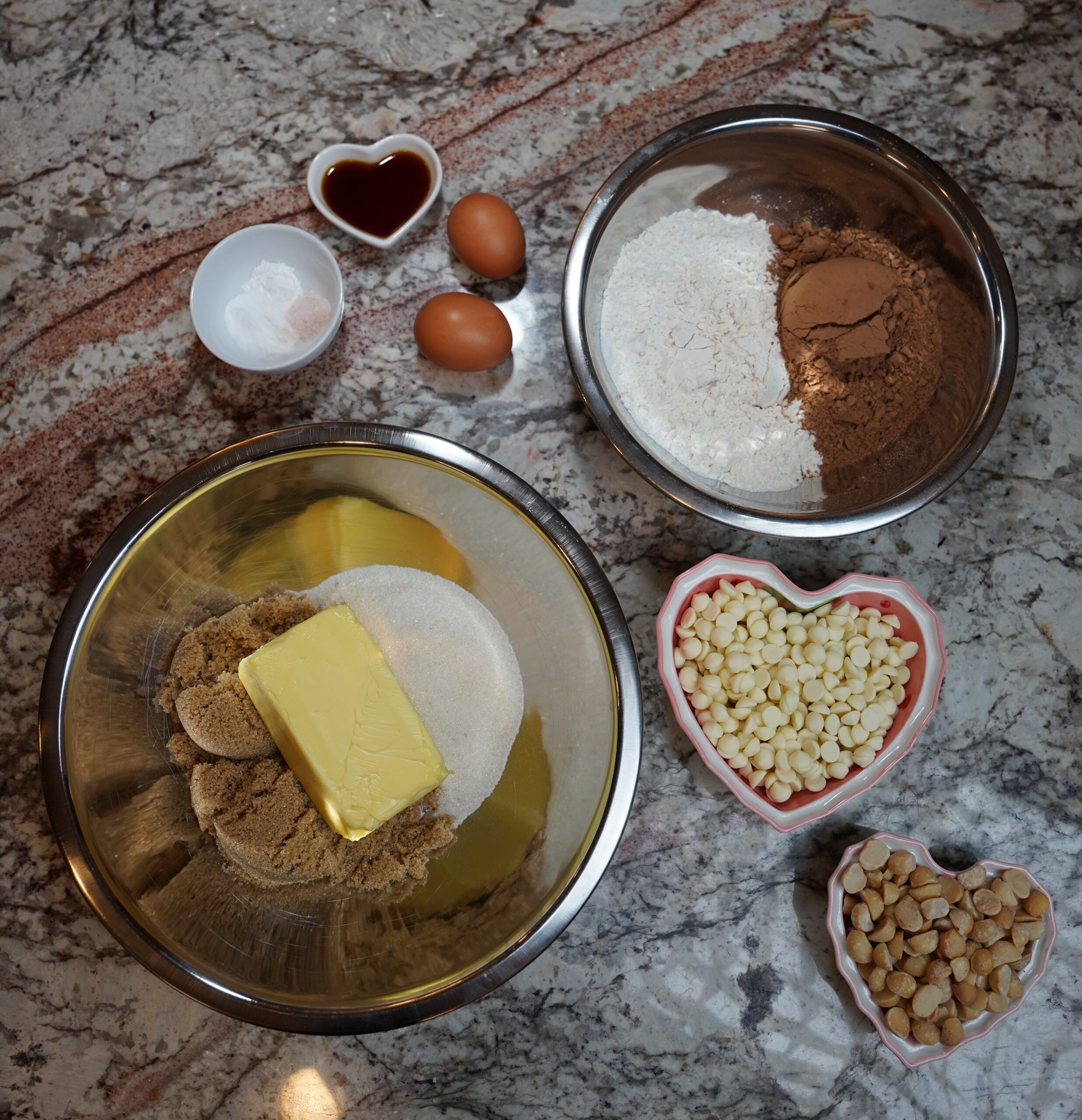 Double Chocolate Macadamia Nut Cookies Ingredients. Flour, coco powder, brown sugar, sugar, butter, salt, baking powder, vanilla, eggs