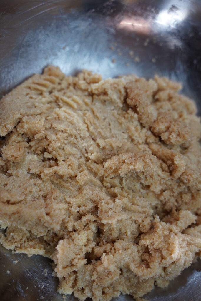 Brown sugar, sugar and butter creamed for Double Chocolate Macadamia nut cookies. Wet ingredients step 1.