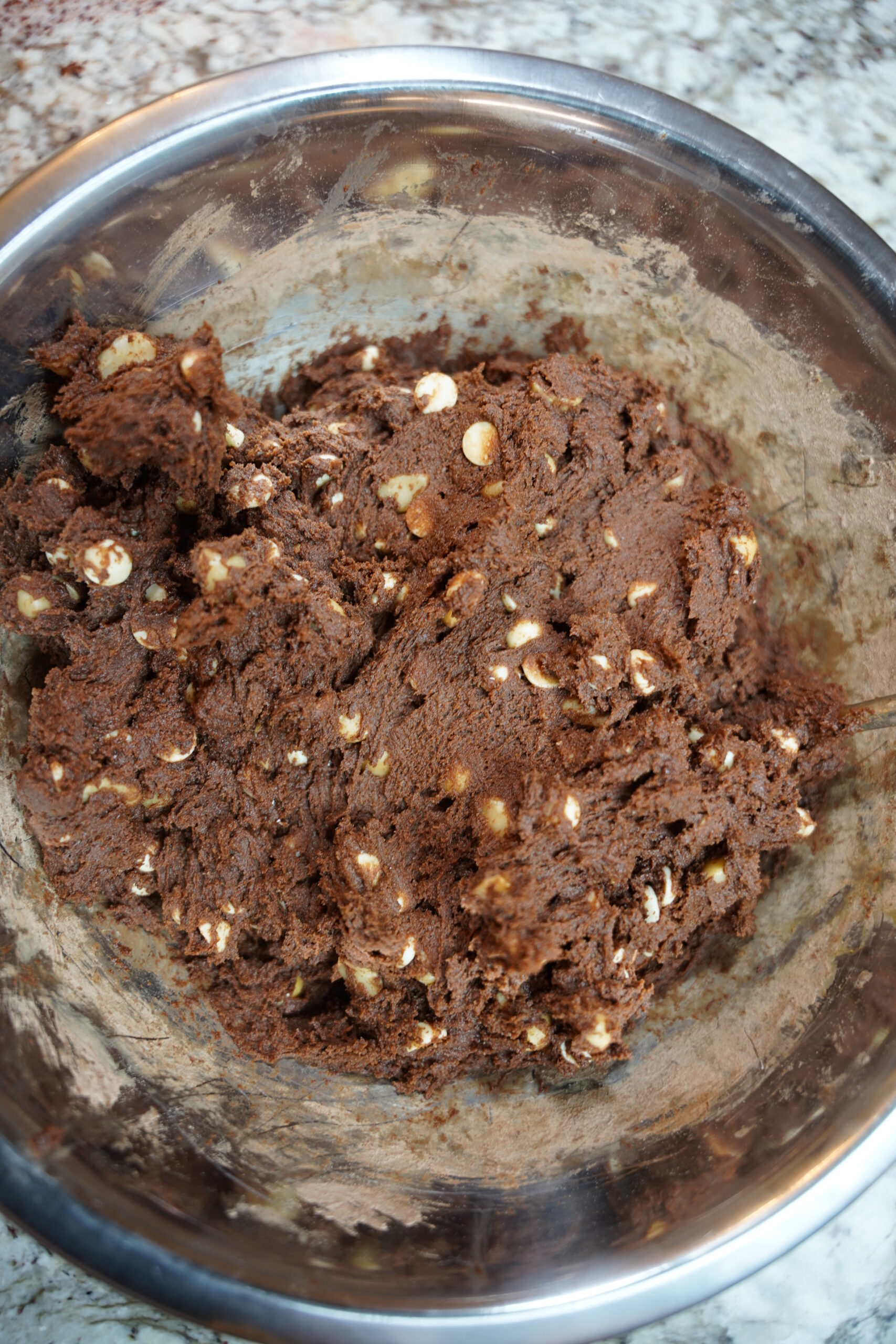 Double chocolate macadamia nut cookies fully mixed.