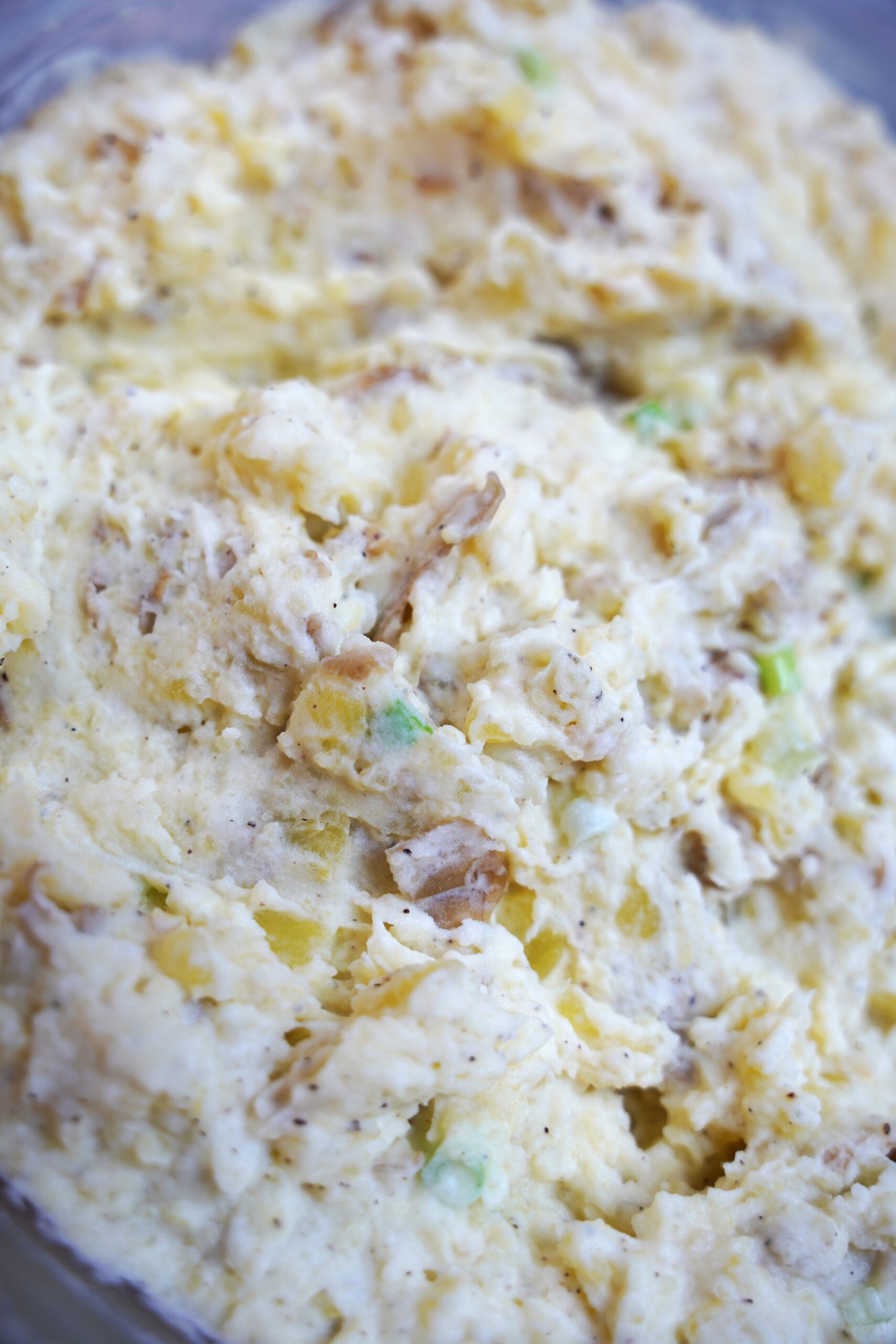 Beautiful close up image of rustic mashed potatoes.