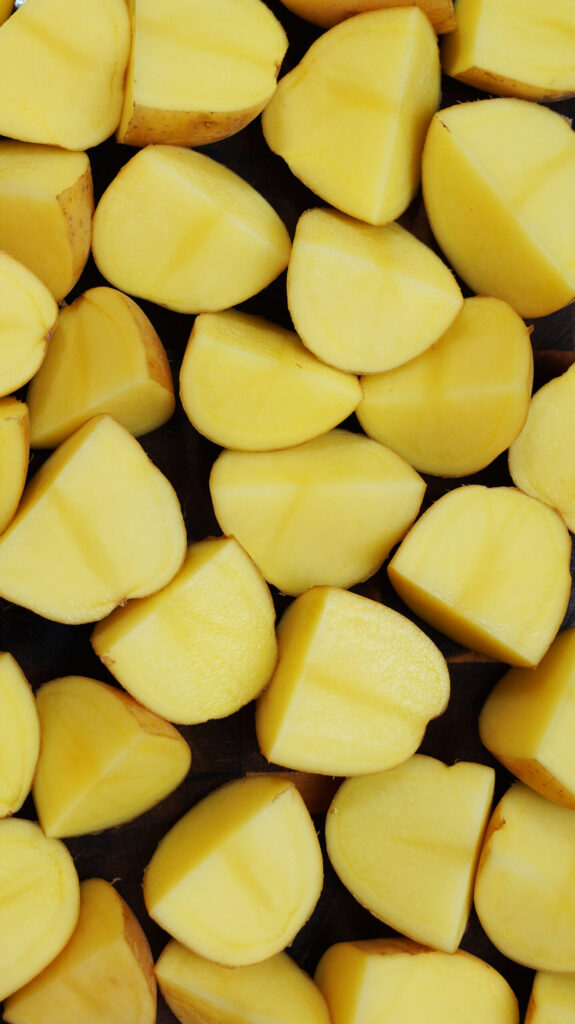 3 lbs of yukon gold potatoes cut into quarters.