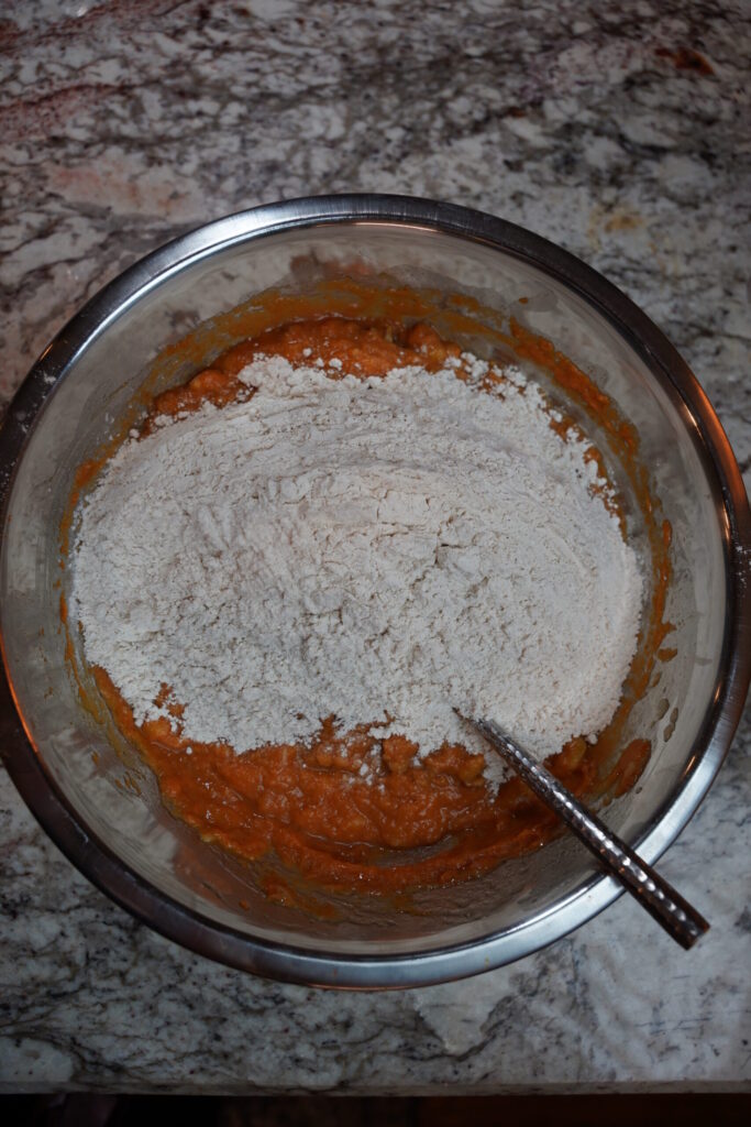 Pumpkin Banana Nut Muffins Step 2. Dry ingredients whisked, added to wet ingredients.