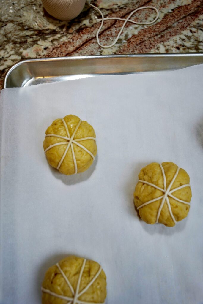 pumpkin shaped dinner rolls step 4. Wrapped in butchers twine and on a cookie sheet, pre-rising.