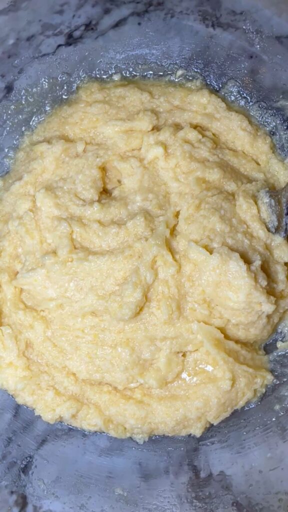 Butter, sugar and an egg mixed together. Wet ingredients for snickerdoodle cookies.