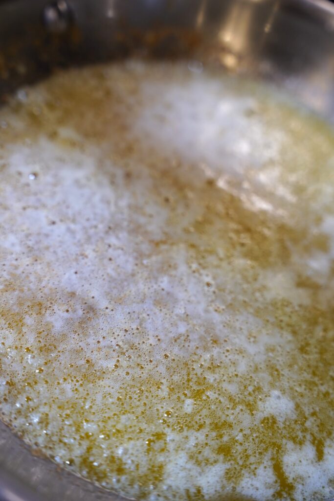 Butter browning in a stainless steel pan