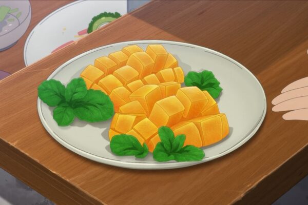 Mango cut in halves and scored with cubes for easy eating. Decorated with fresh herbs on a white plate that's resting on a wooden table. Anime style art.